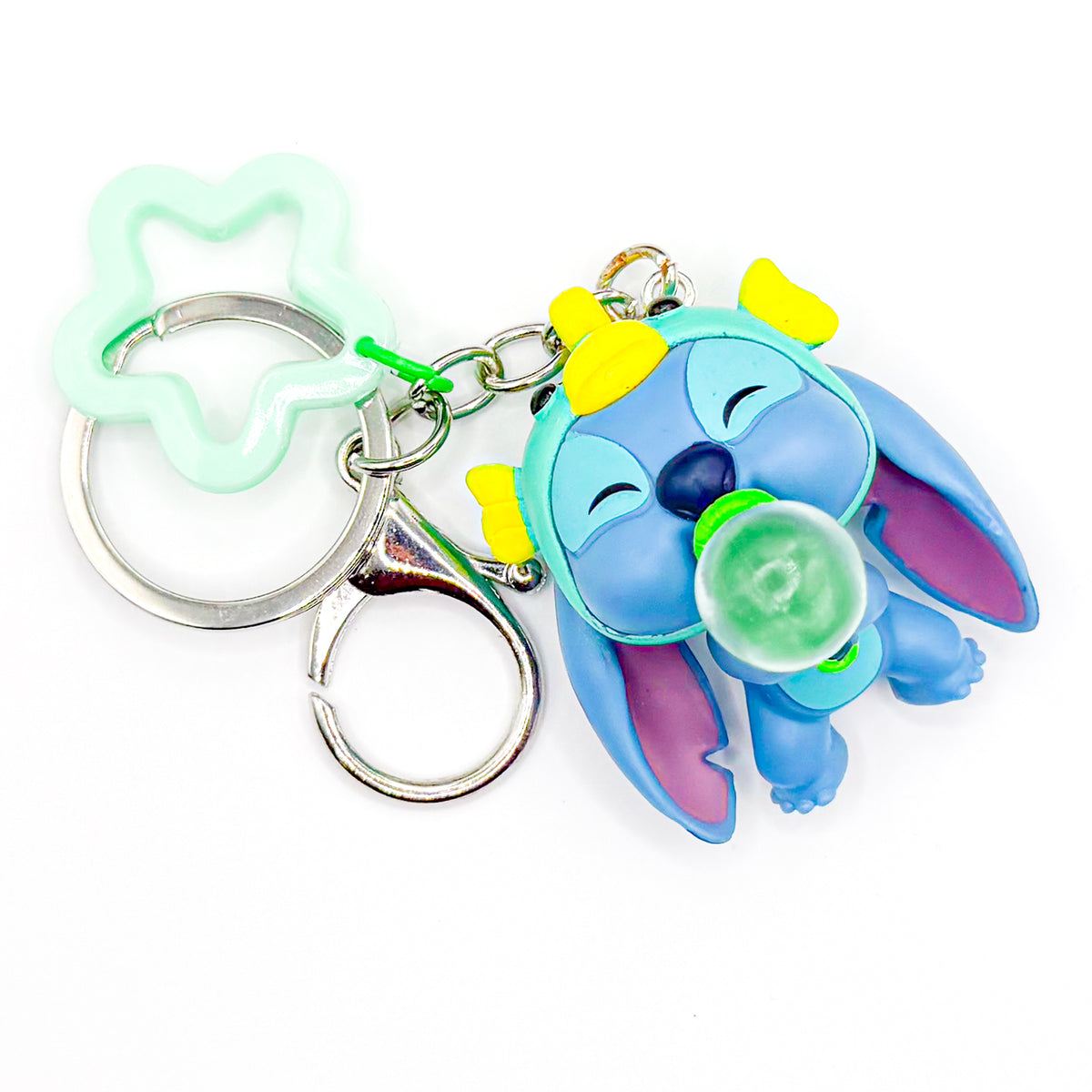 Little Blue Guy Blowing Bubbles Keychain